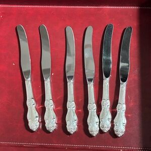 Elegant Silver Knives Set